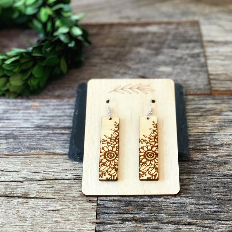 Laser cut and engraved wood sunflower earrings