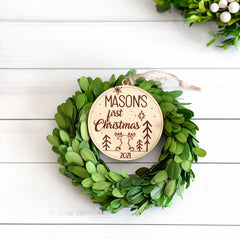 Baby's first Christmas engraved keepsake wooden ornament with cute reindeer, customizable with first name and year