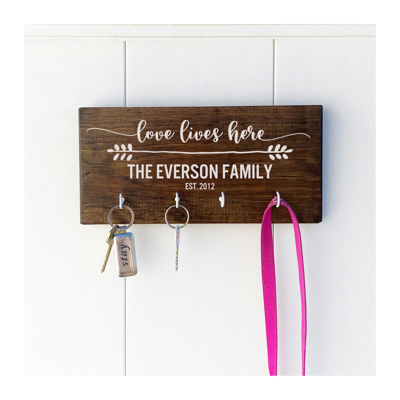 Love lives here personalized key holder for wall with family name and established date, wooden key holder with 4 hooks, rustic key rack, farmhouse style, realtor - Bloom And Anchor